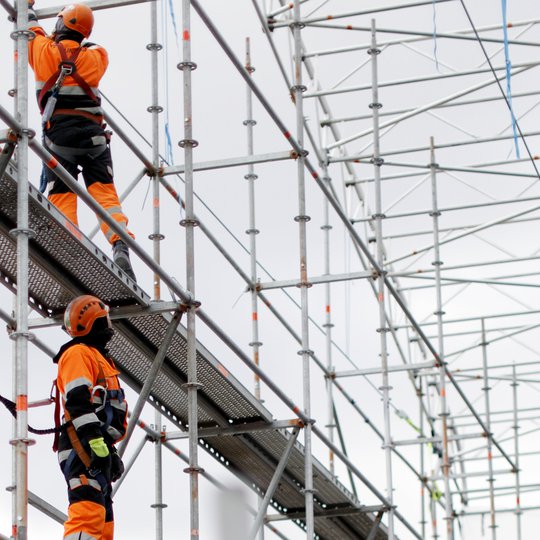 Telinekataja Miehet telineillä